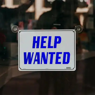 Help wanted sign.