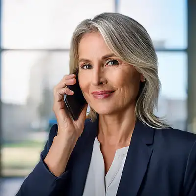  A woman on the phone helping with finding a drug rehab.