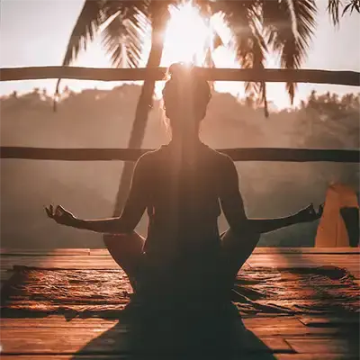 woman practicing meditation.